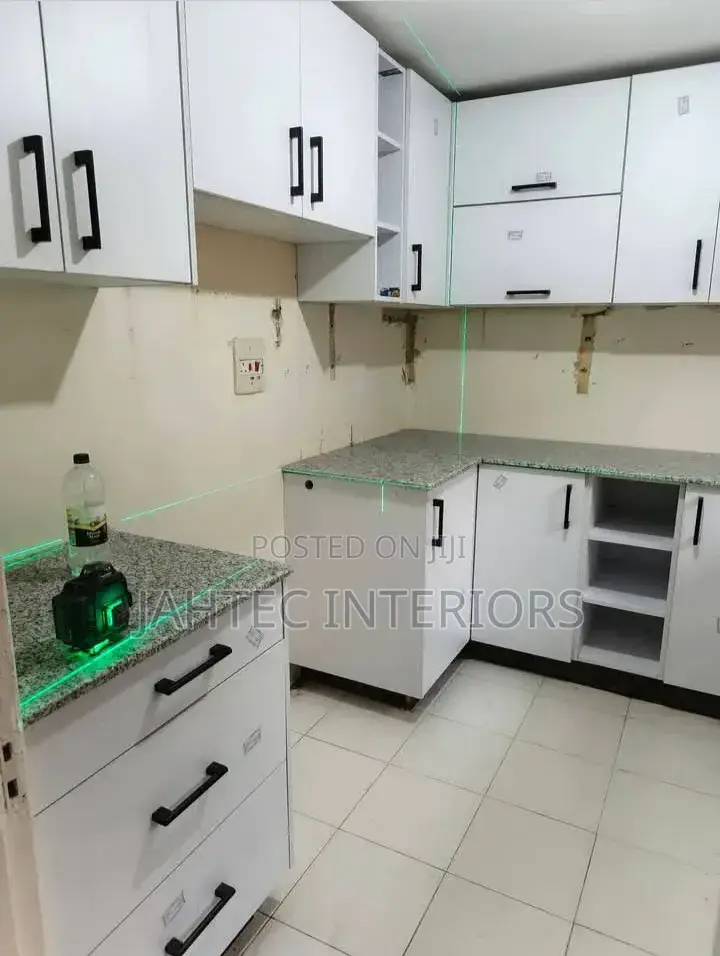 Repairs for Kitchen Cabinets and Fitting Work