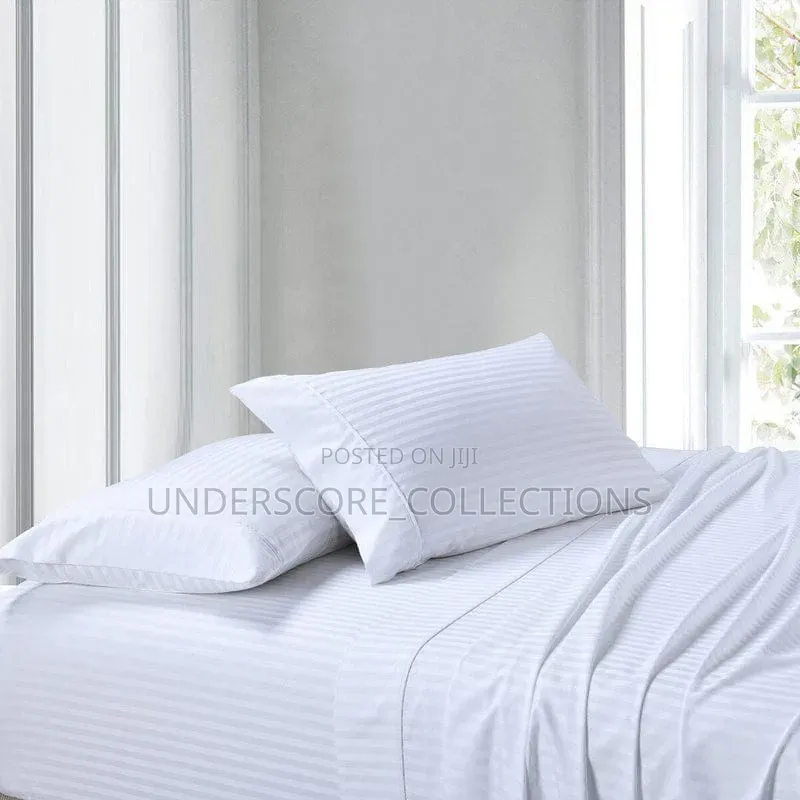 2 White Stripped Bedsheets With 2 Pillow Cases