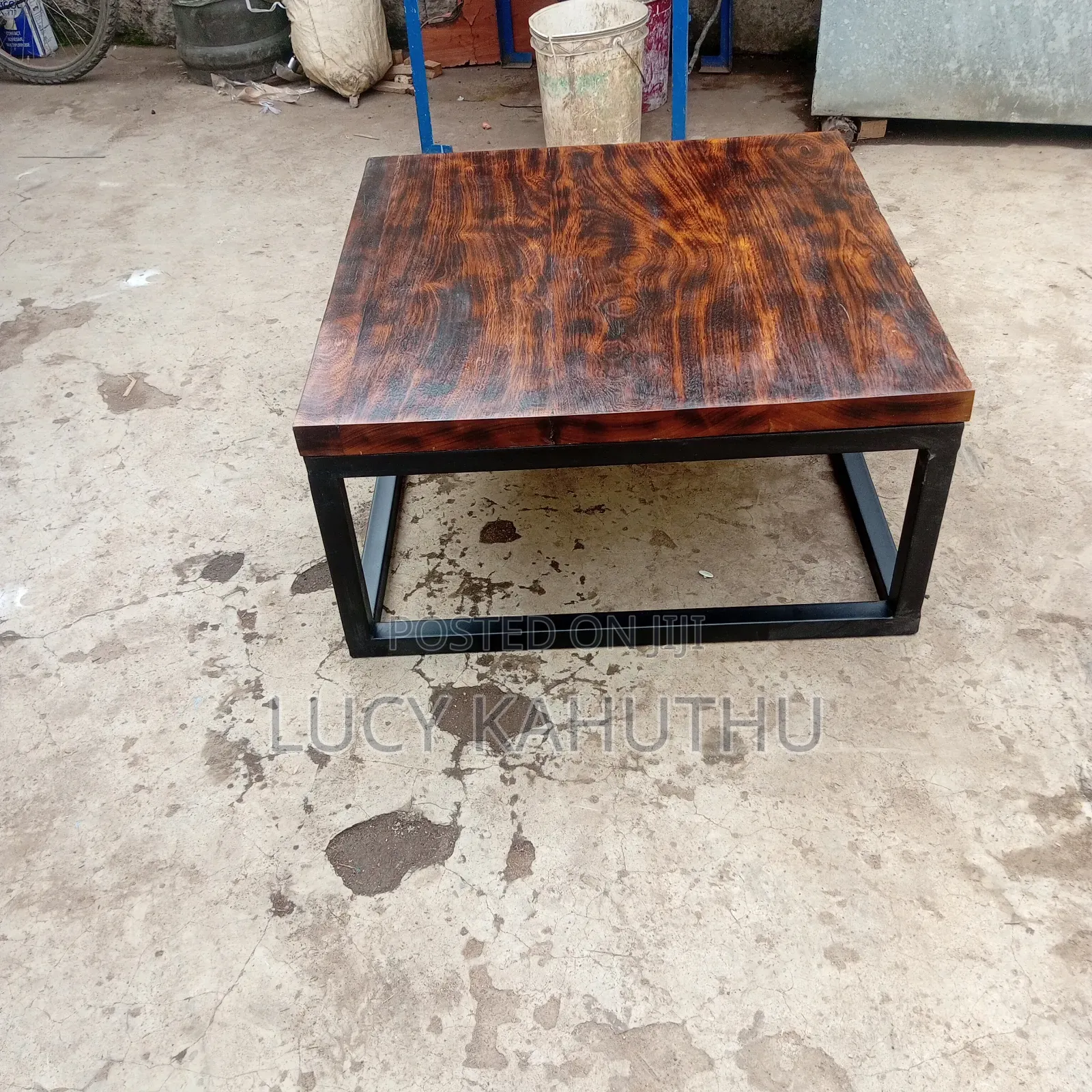 Mvule Coffee Table With Mat Powder Coated Frame