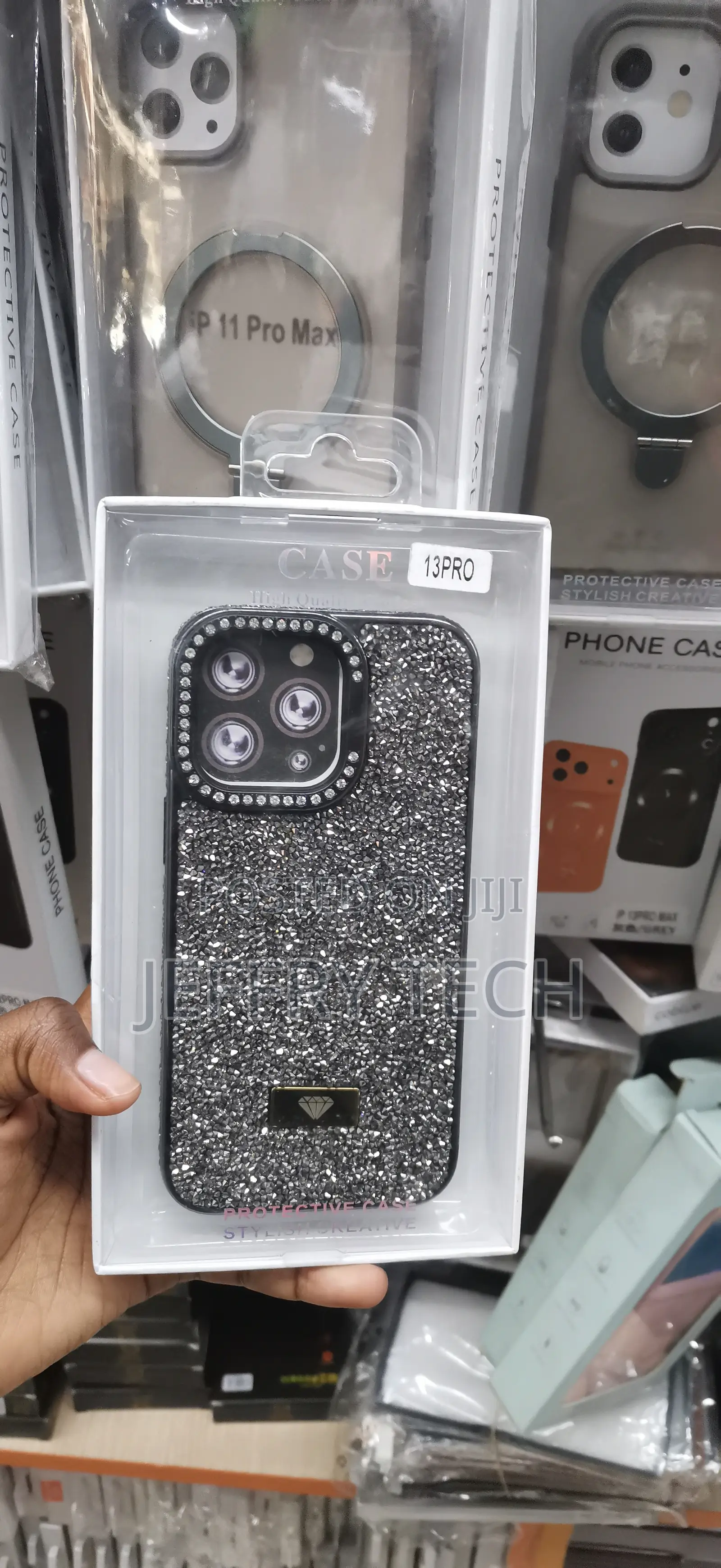 iPhone 13 Pro, Featuring a Decorative Diamond-Shaped Logo Emblem Case