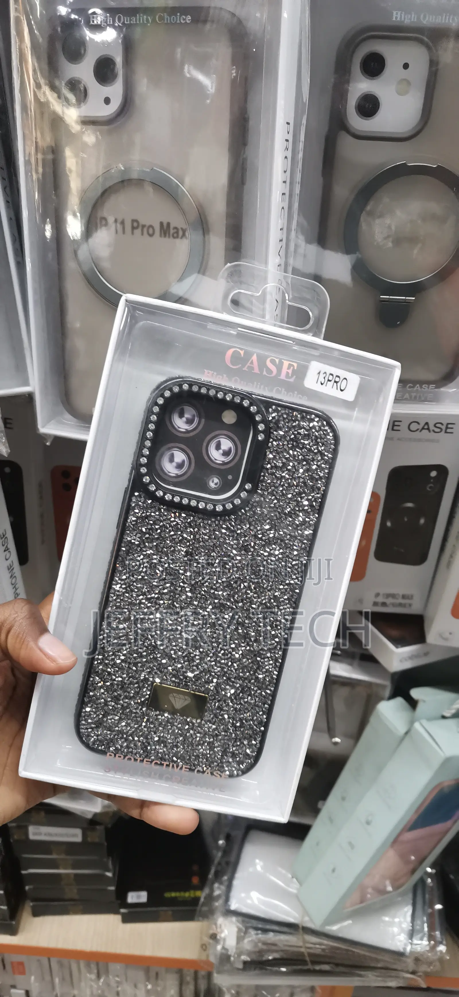 iPhone 13 Pro, Featuring a Decorative Diamond-Shaped Logo Emblem Case