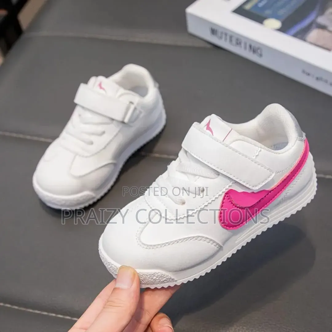 Kids Sneakers With a Tick
