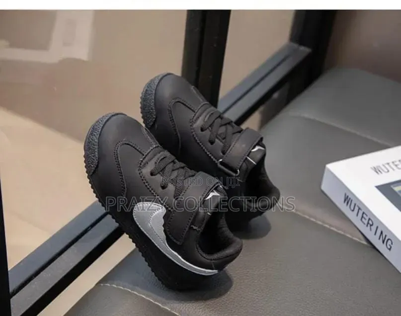 Kids Sneakers With a Tick