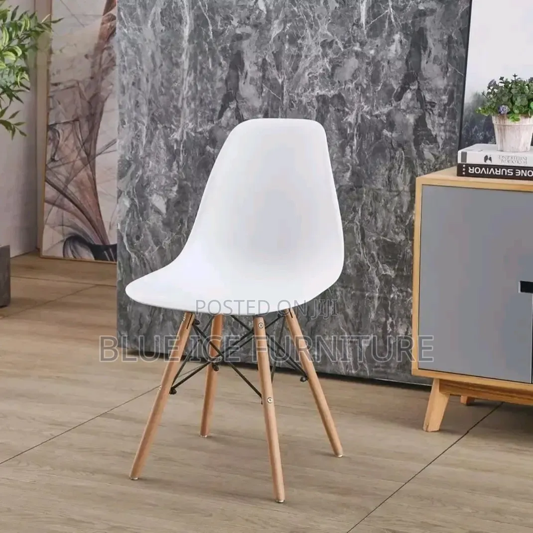 Eames Plastic Dining Chair With Wooden Leg