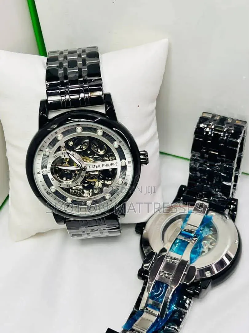 Patek Phlippe Skeleton Automatic Watch. Gold, Silver and Black.
