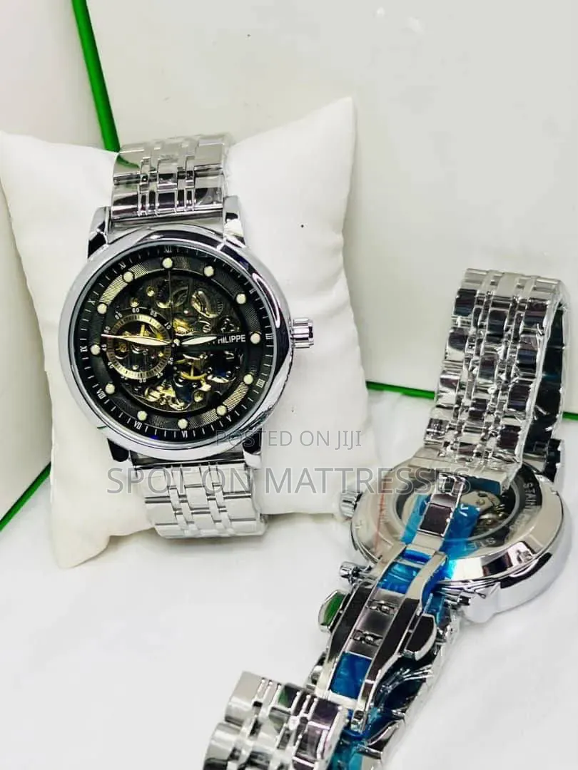 Patek Phlippe Skeleton Automatic Watch. Gold, Silver and Black.