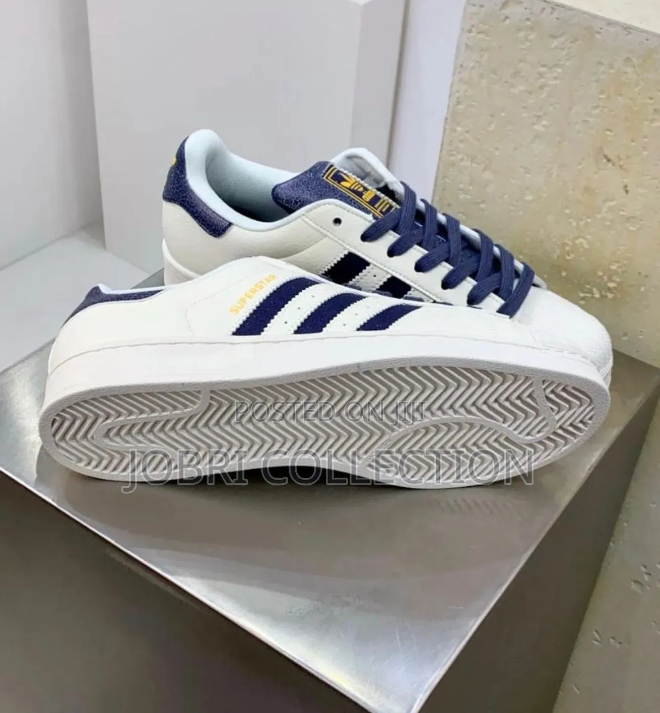 Adidas Superstar “ White Navy “
Sneakers