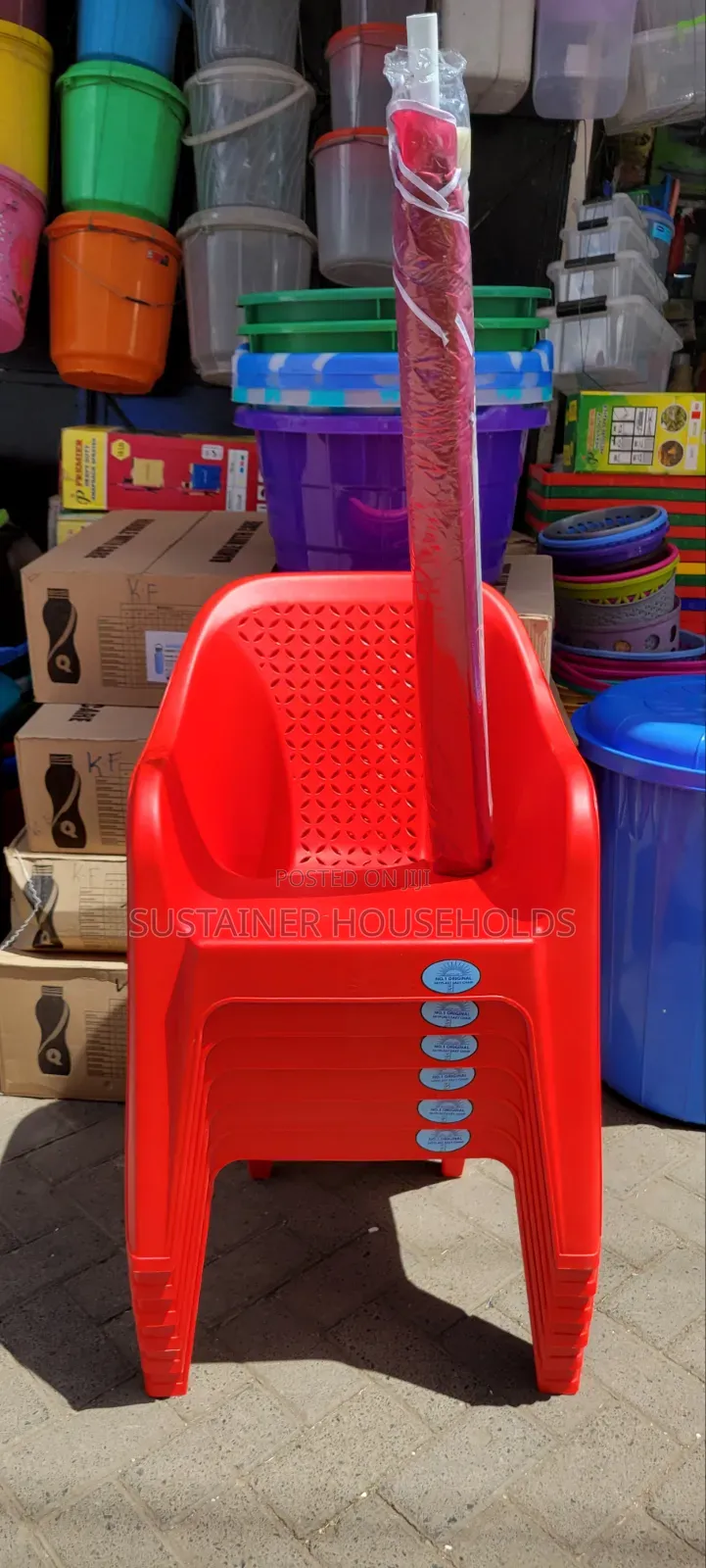6pcs Skyplast Plastic Chairs and a Red Umbrella