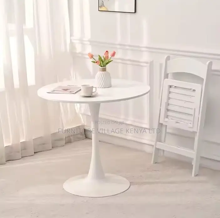 Round Home Eamess Dining Table