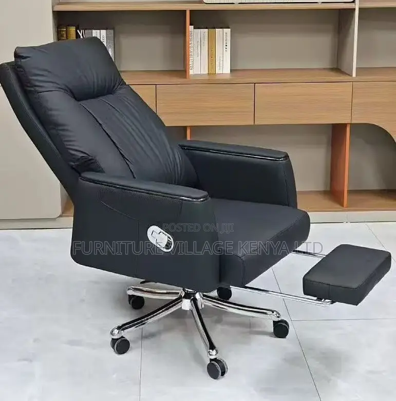Leather Swivel Chair With Reclining Footrest