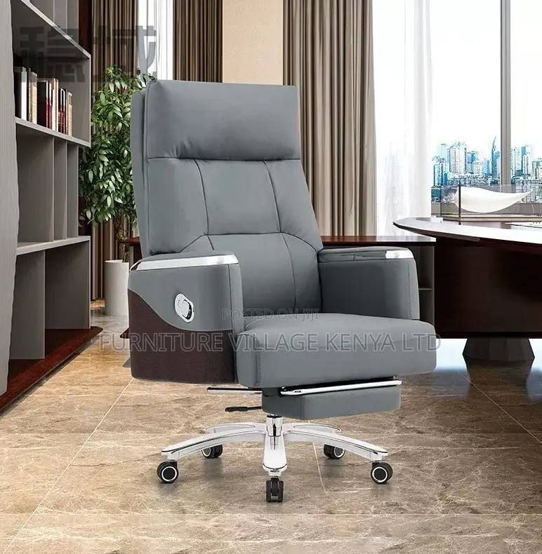 Leather Swivel Chair With Reclining Footrest