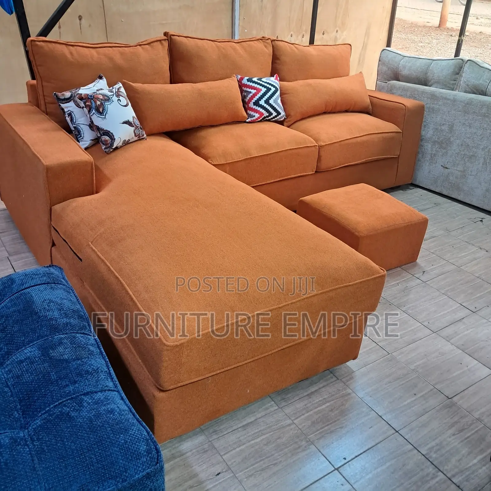 6-Seater Grey Cushioned L-Shaped Sofa With Footrest