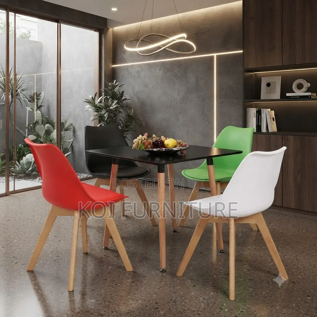 Dining Chairs; Plastic Eames Upholstered Dining Chairs