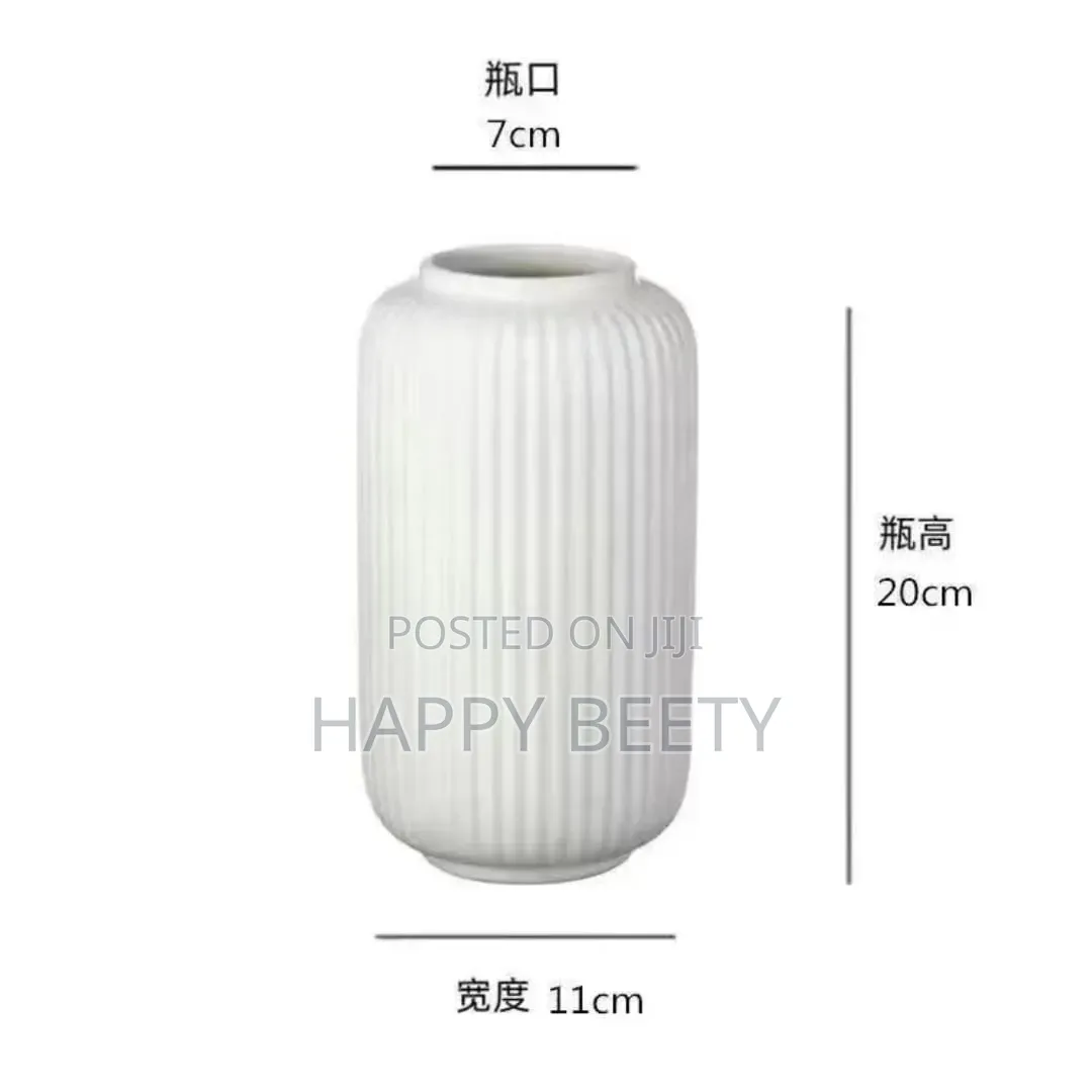 Sleek Heavy Ribbed Modern Elegant Vase With a Glossy Finishing