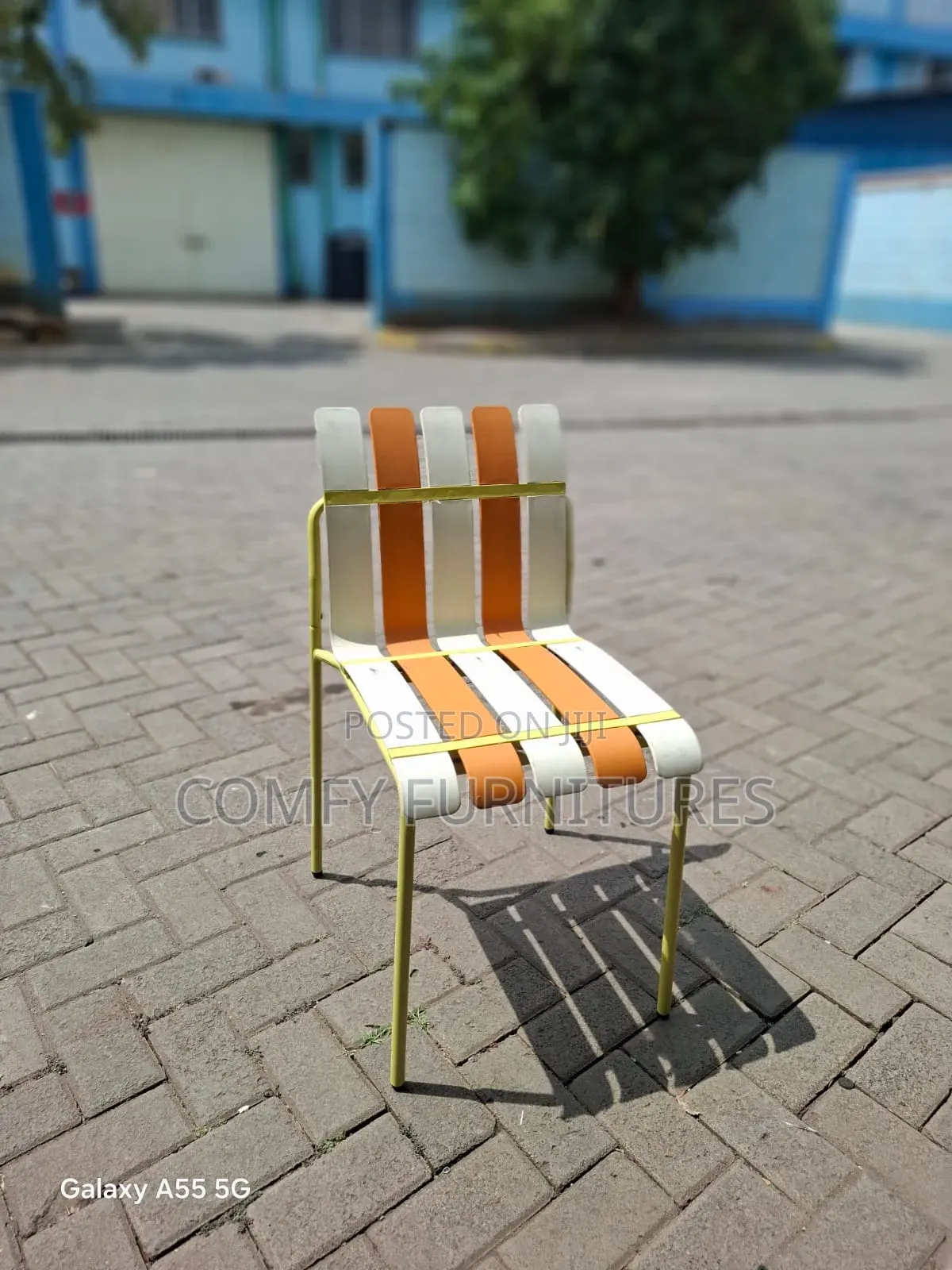 Vibrant Orange and White Slatted Accent Chairs
