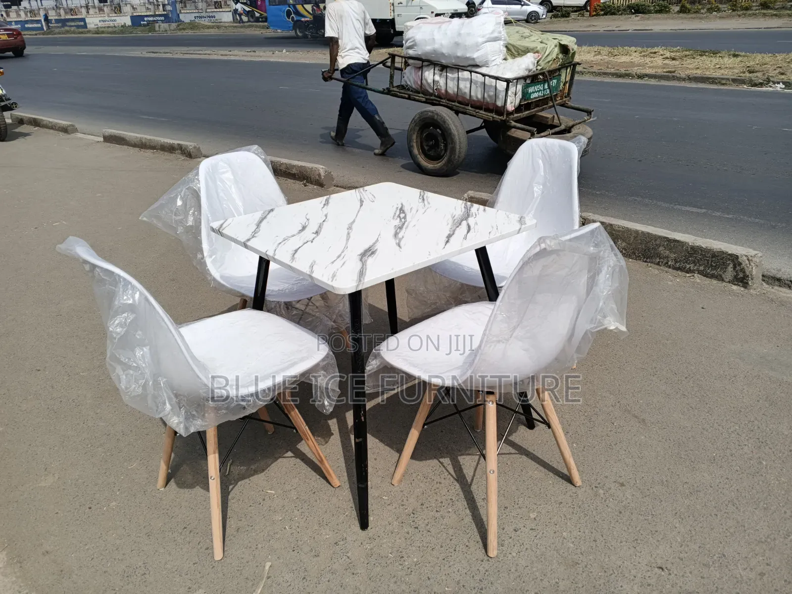 4 Seater Square Marble Dining Set With 4 White Eames Chair