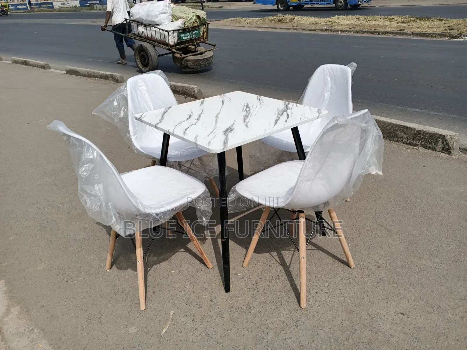 4 Seater Square Marble Dining Set With 4 White Eames Chair