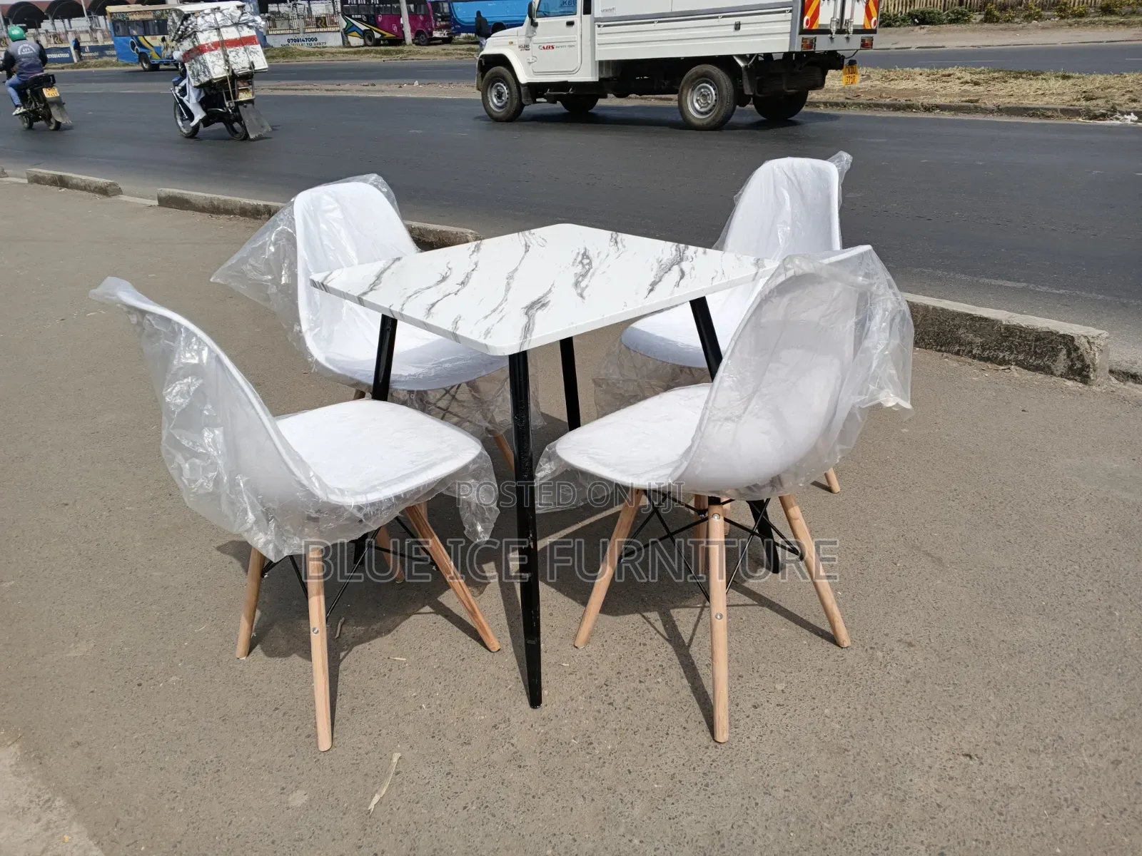 4 Seater Square Marble Dining Set With 4 White Eames Chair