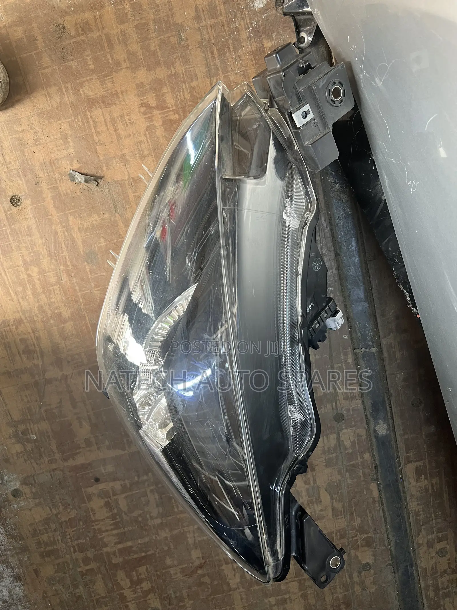 Mazda Demio Headlight (DB)