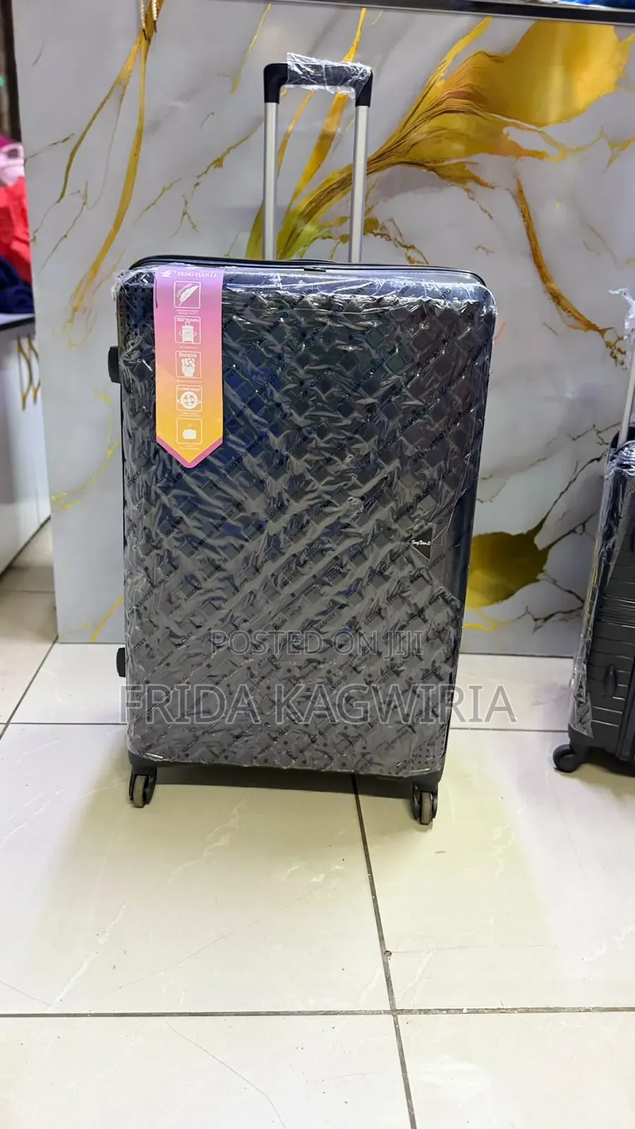 Navy Blue XL Extra Large Rubber Suitcase 
Height 75cm