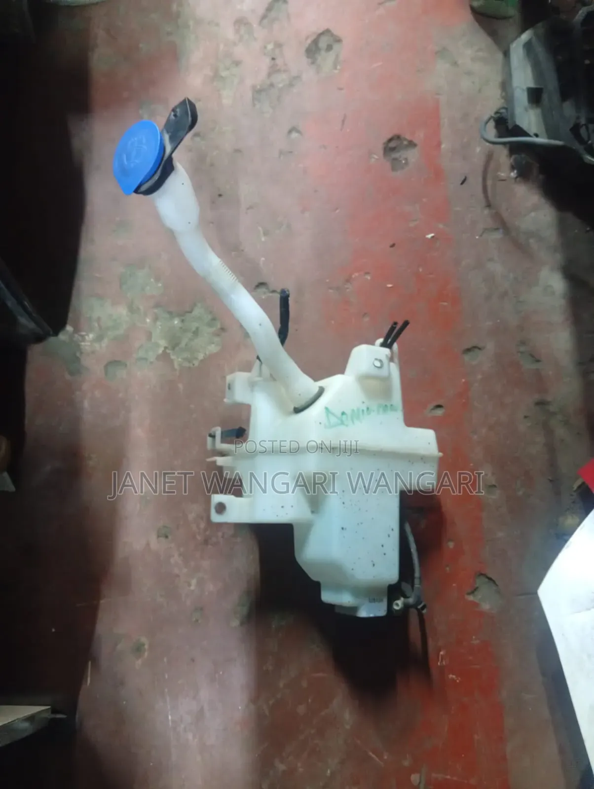 Washerbottle/Washertank Mazda Demio New Model