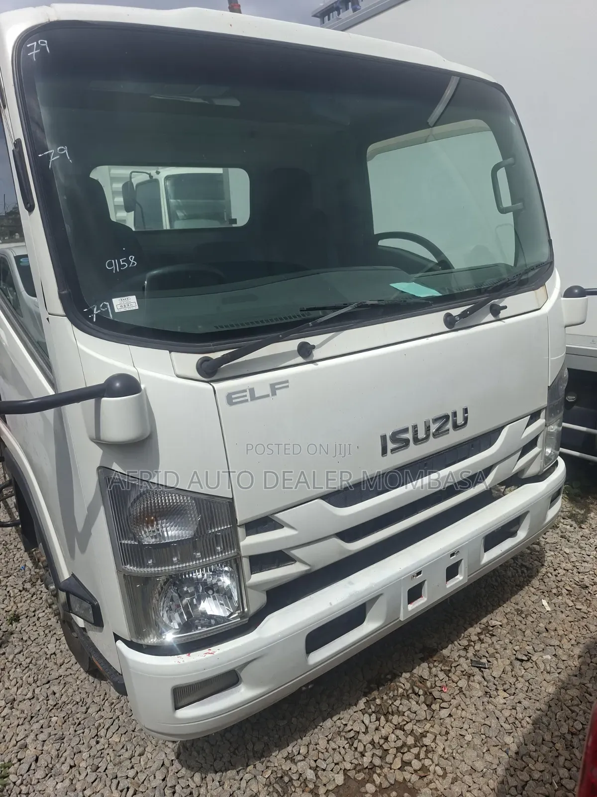 Isuzu Elf Flat Bed Towing Truck