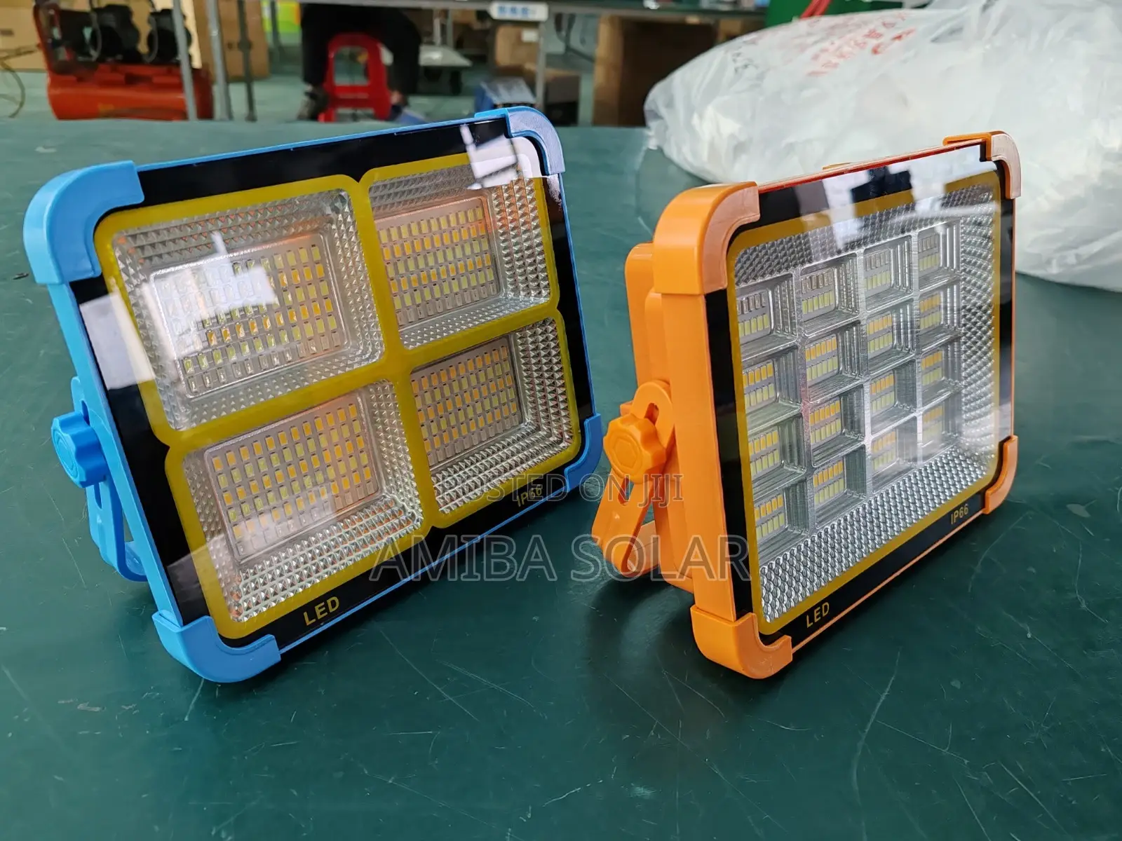 200 Watts Solar LED Flood Camping /Emergency Light and Phone Charger