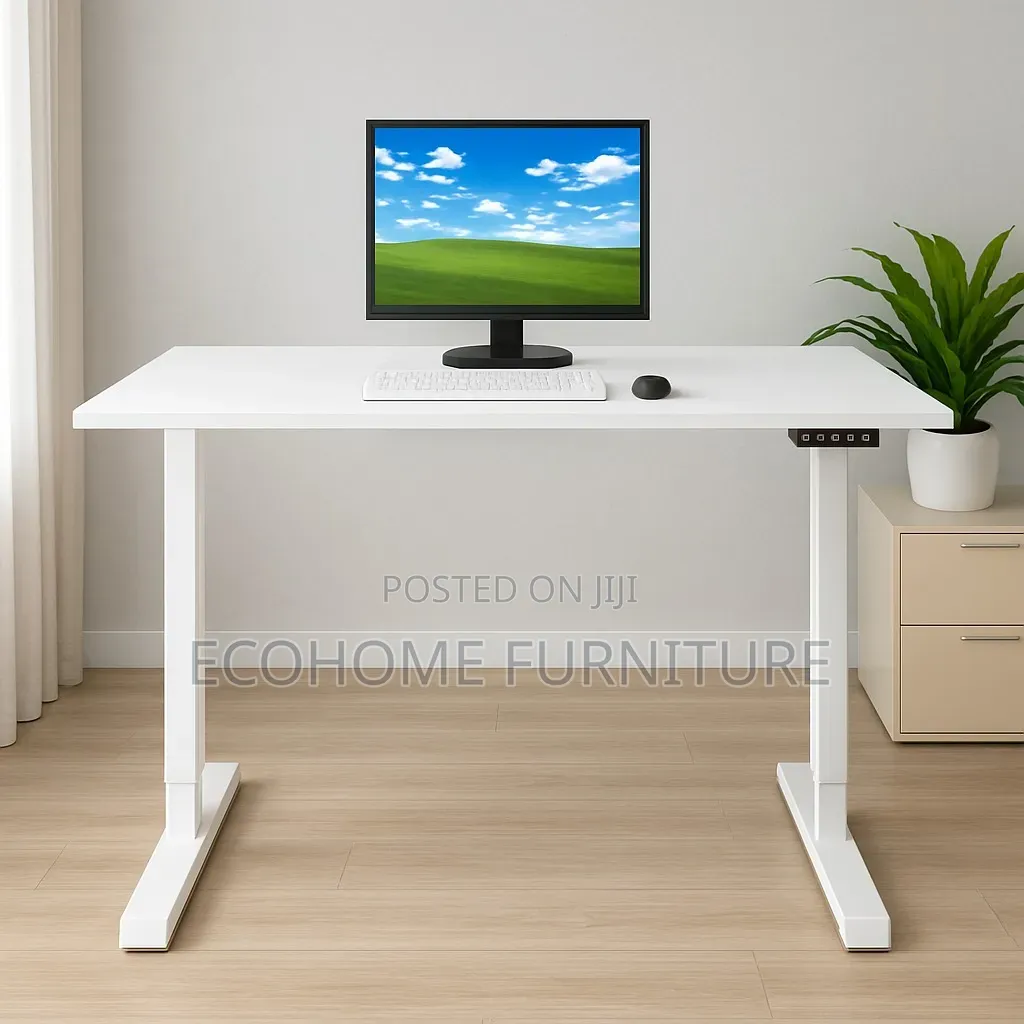 Electric Desk . 1.4m by 0.6m Adjustable Height