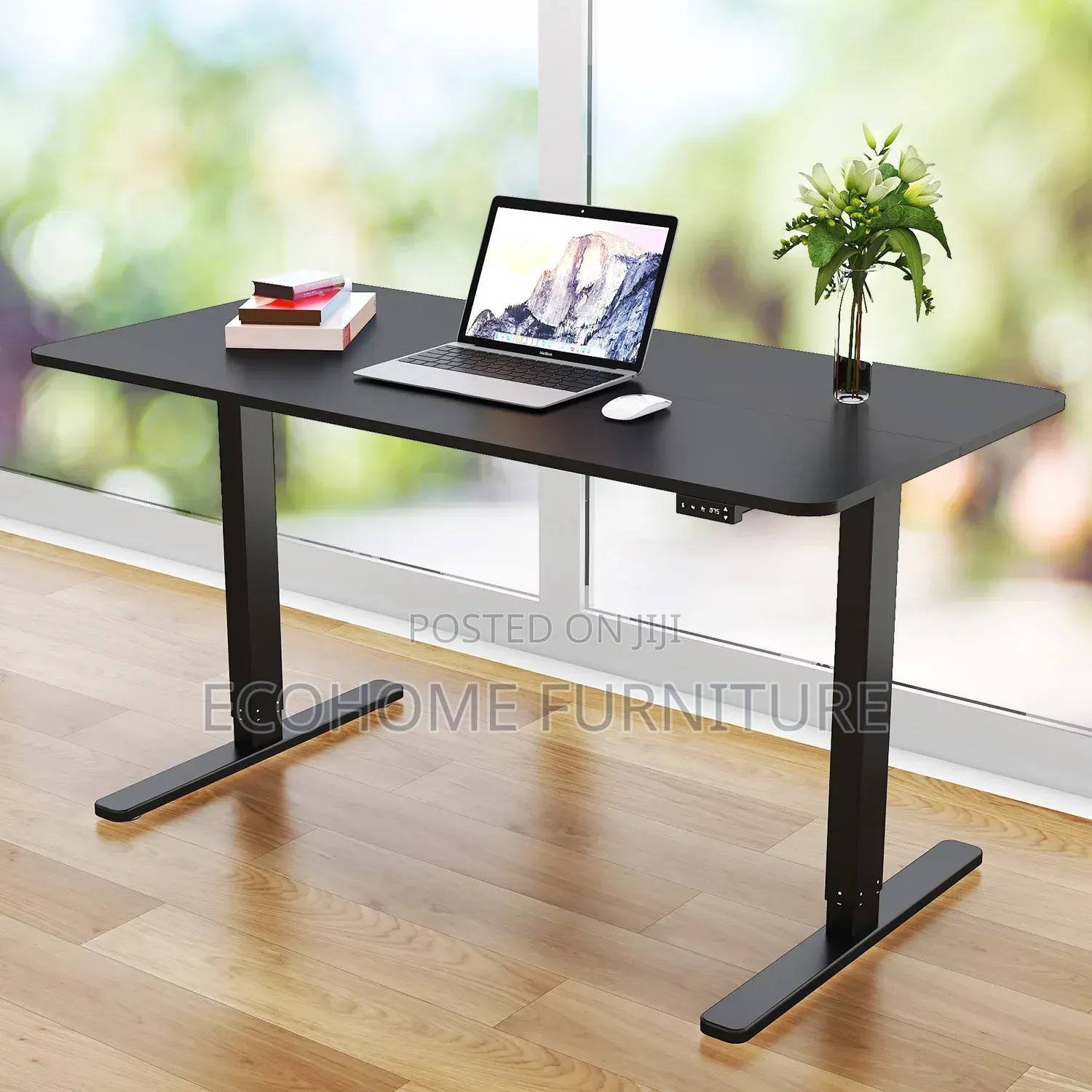 Electric Desk. Black ,Adjustable Height 1.4m by 0.6m