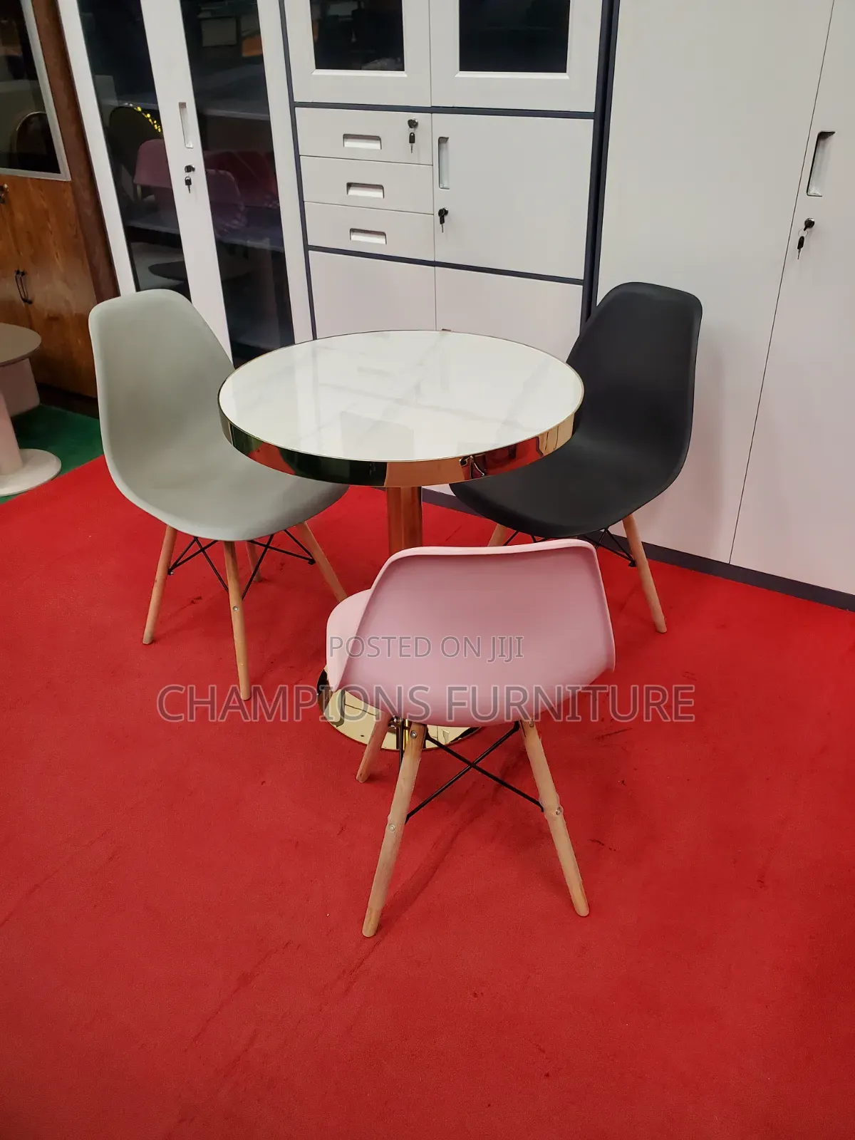 Gold Pedestal Table and Eames Chairs Set