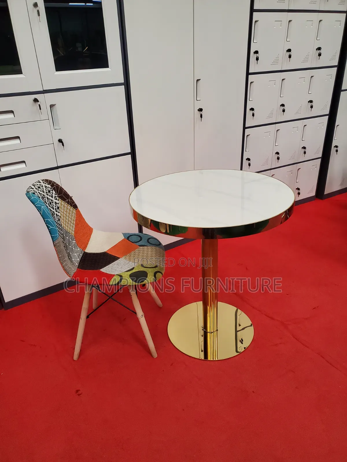 Gold Pedestal Table and Patchwork Accent Chair