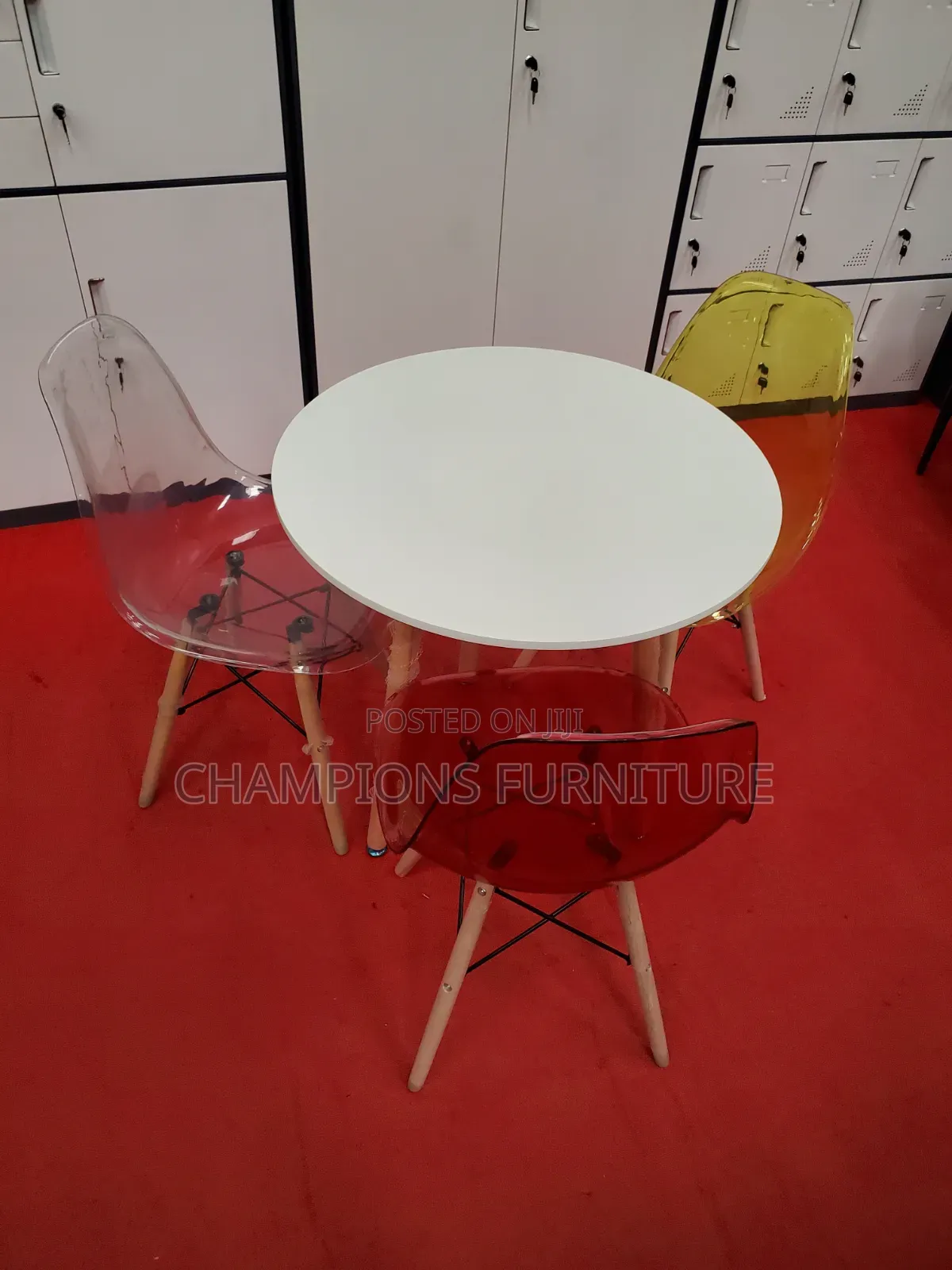 White Round Table and Eames Chairs