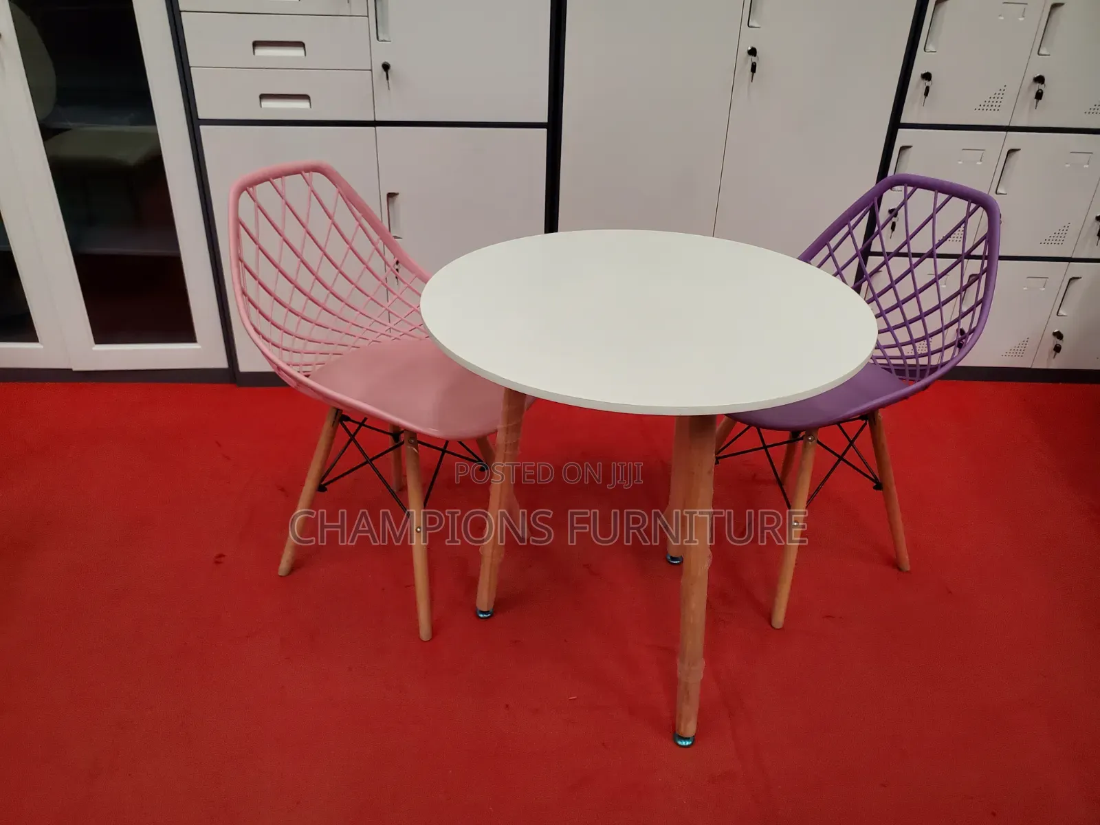 White Round Table and Eames Chairs