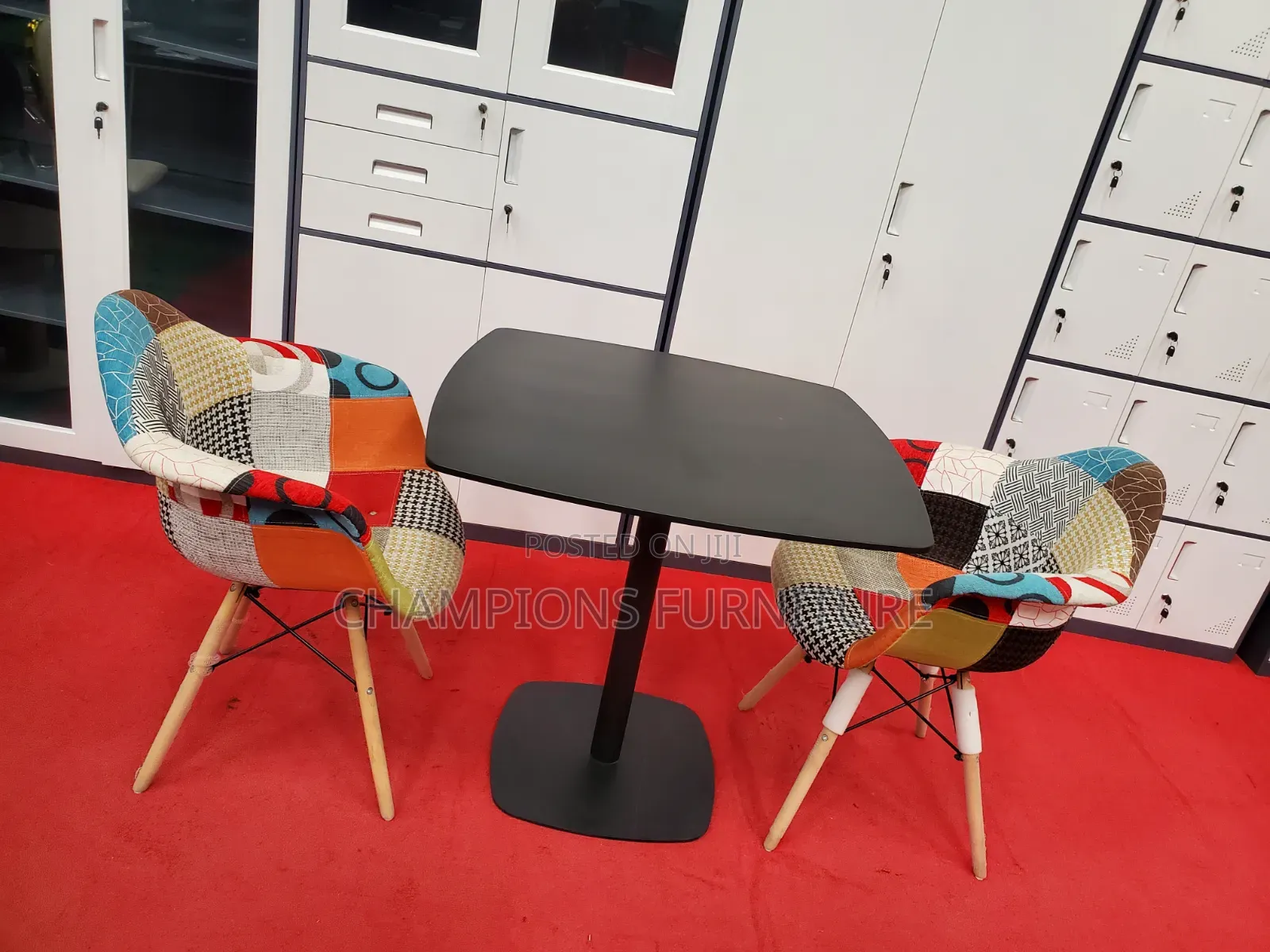 Black Square Table and Patchwork Eames Chairs