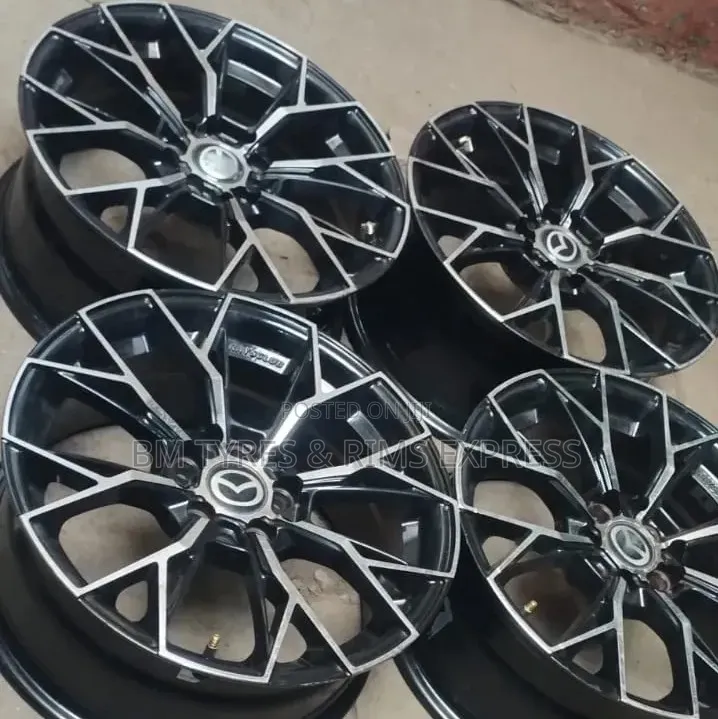 Rims Size (16) 5 Holes. (MAZDA AXLA)