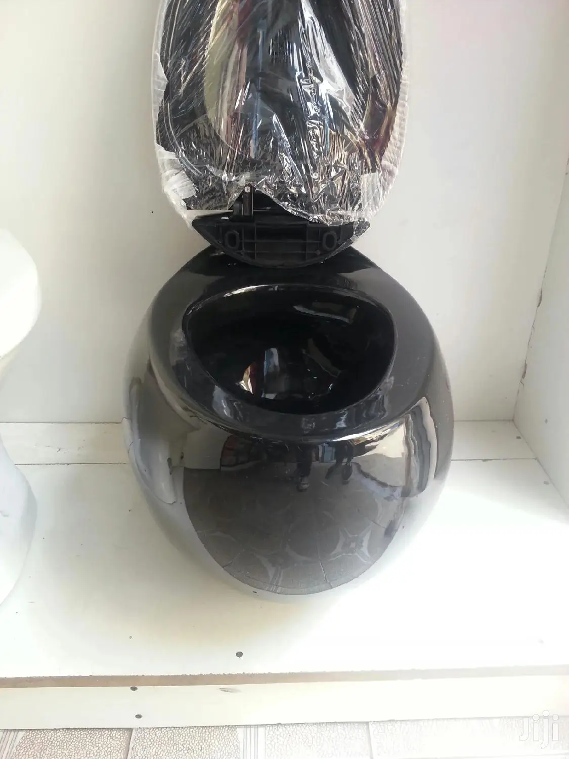 Black In Colour Concealed Toilets