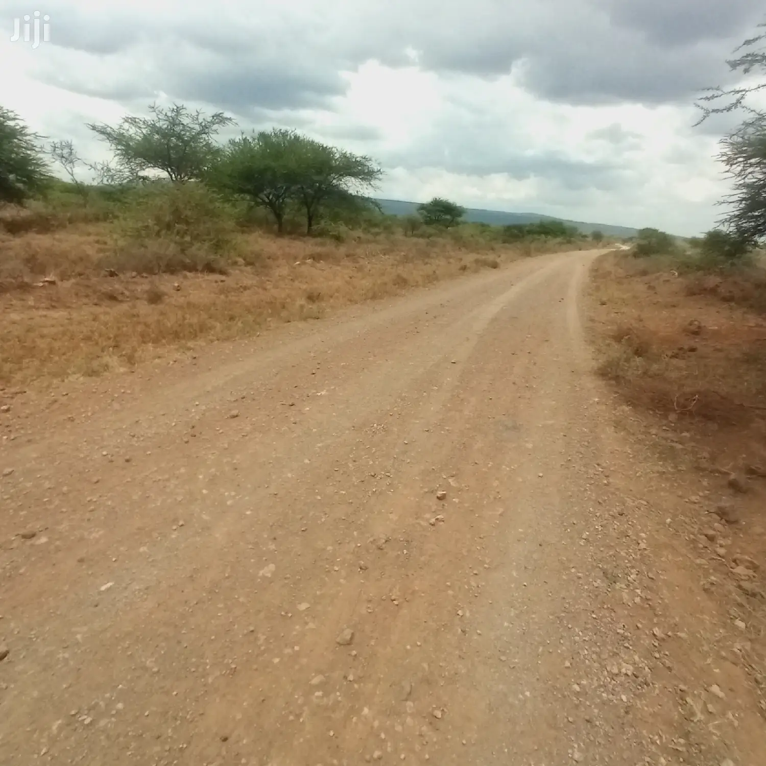 Prime 10 Acres Touching Tinga Najilei Road at 450k Per Acre