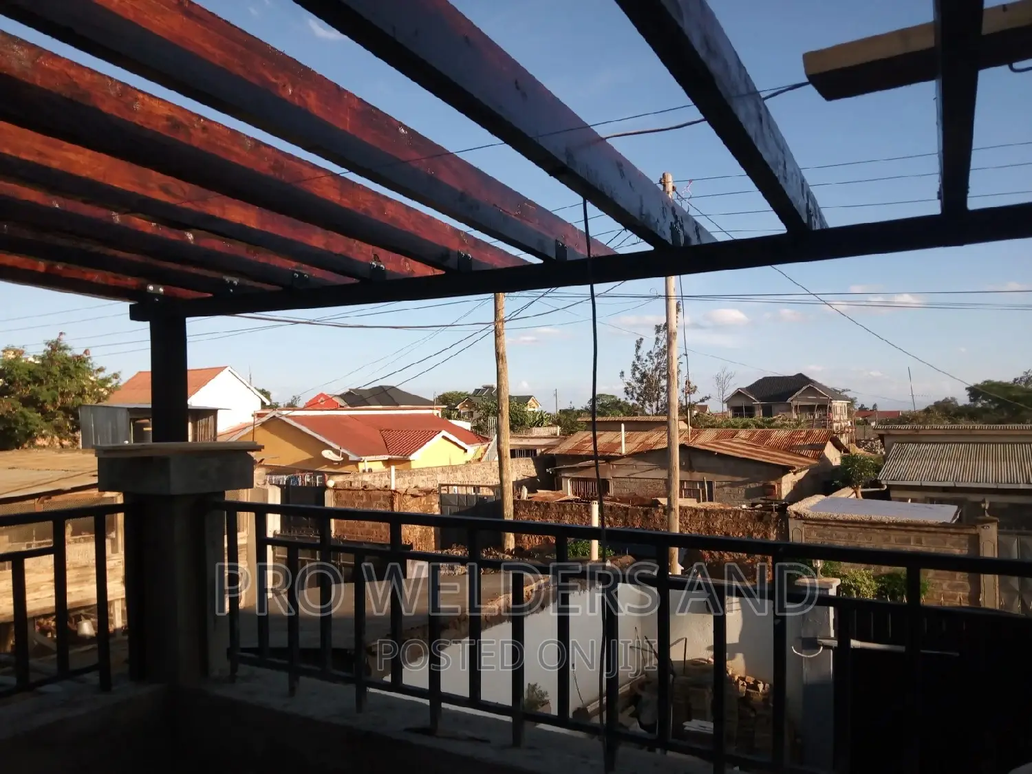 Pergola With a Touch of Steel and Wood