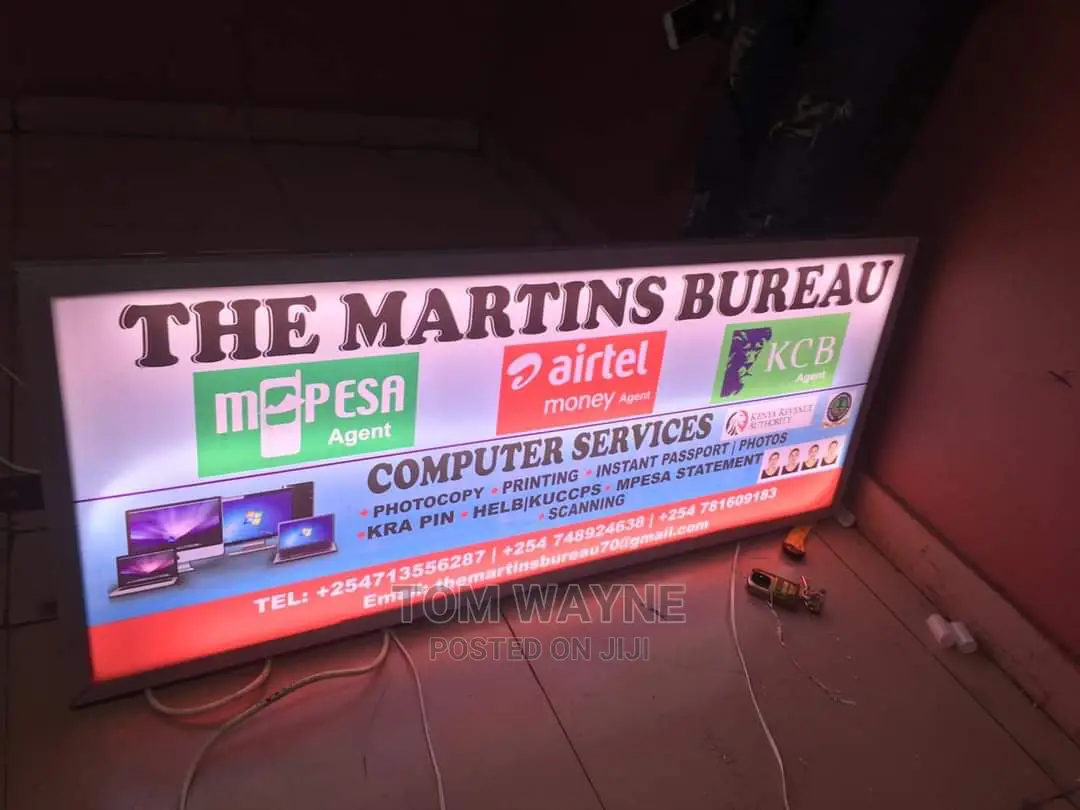 Mpesa Poster and Light Boxes With Signage