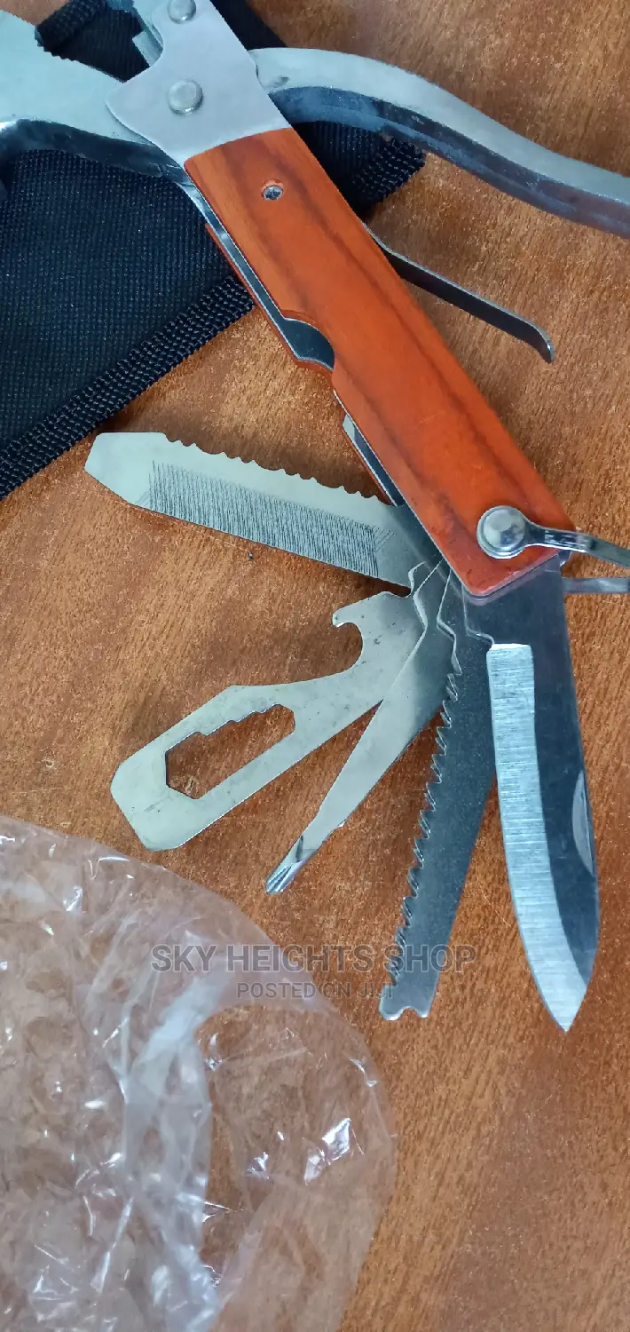 Pen Knife, Hammer, Bottle Opener, Pliers & Screw Driver IN 1