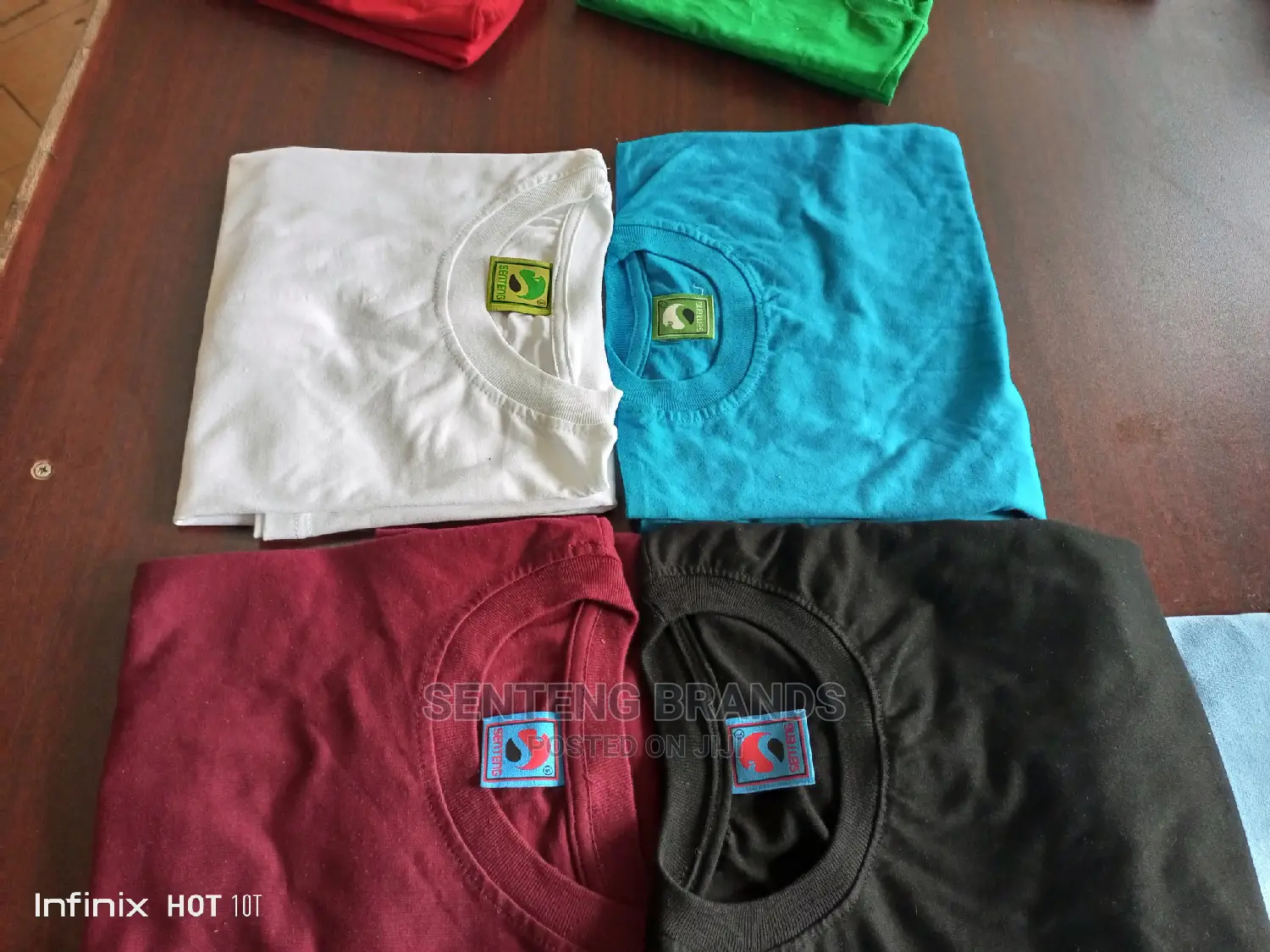 100% Cotton T-shirts.Black , White , Maroon and True Blue