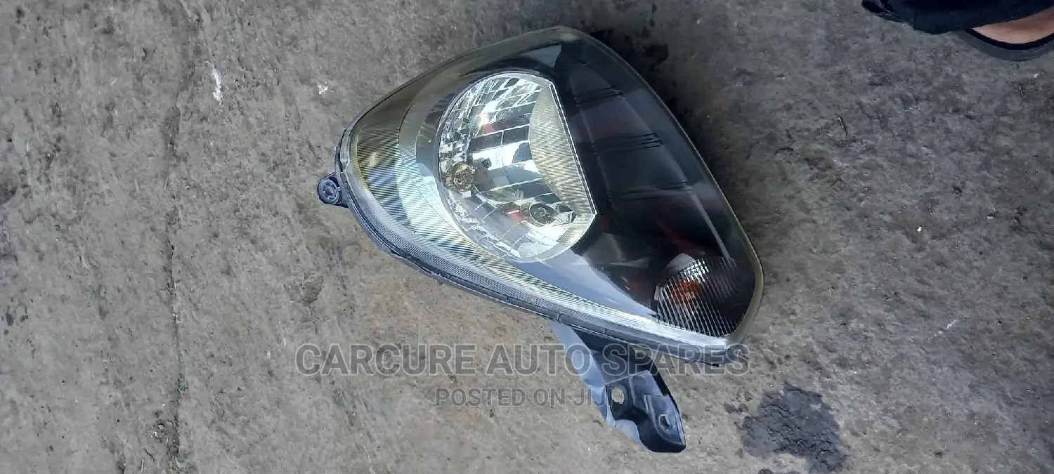 Daihatsu Mira Headlight