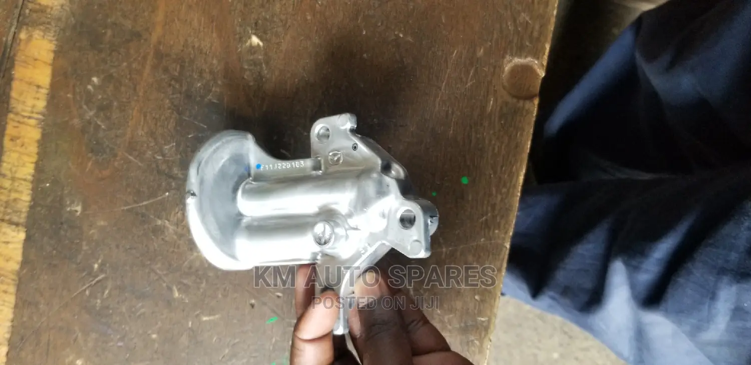 Oil Filter Holder, Mazda Demio, P3 Engine.