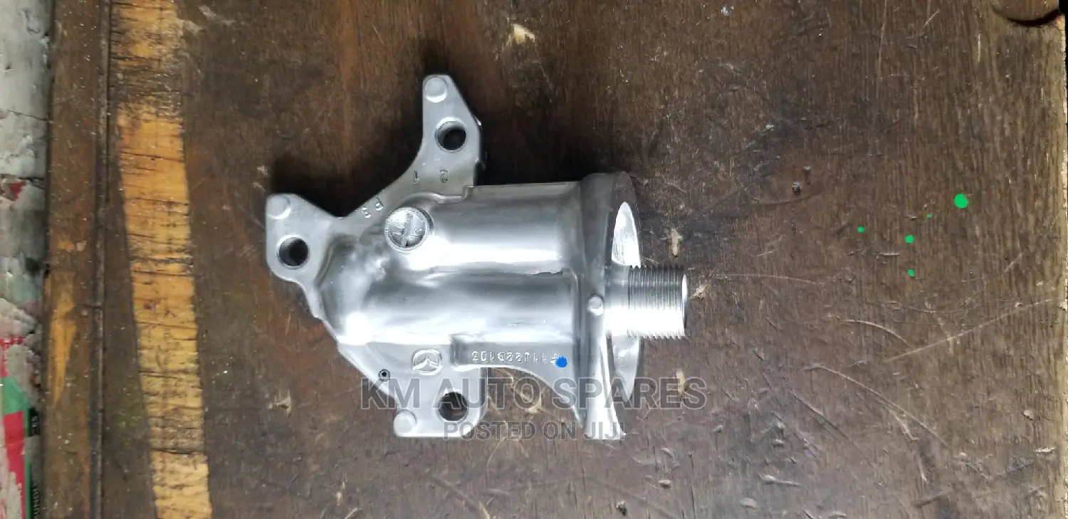 Oil Filter Holder, Mazda Demio, P3 Engine.