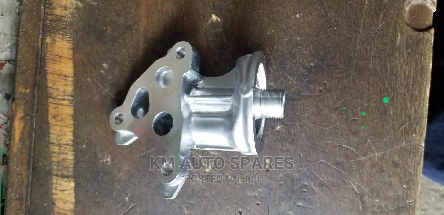 Oil Filter Holder, Mazda Demio, P3 Engine.