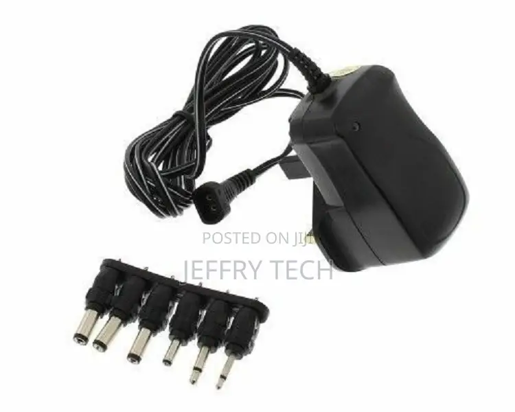 Universal AC/DC Mains Power Adaptor Plug Charger 3v - 12v Ou