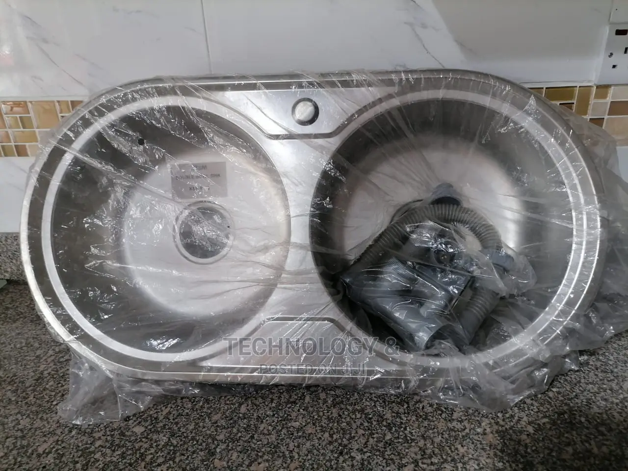 STAINLESS KITCHEN SINK( Circular Double Bowl Sink.)