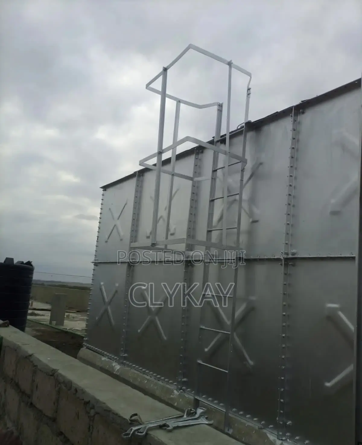 Pressed Panel Tank Mounted on a Dwarf Wall