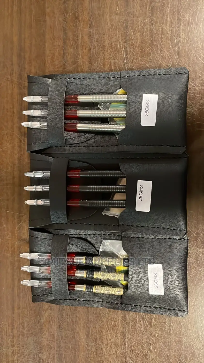 A Set of Tungsten Darts 26g in a Wallet With Flights