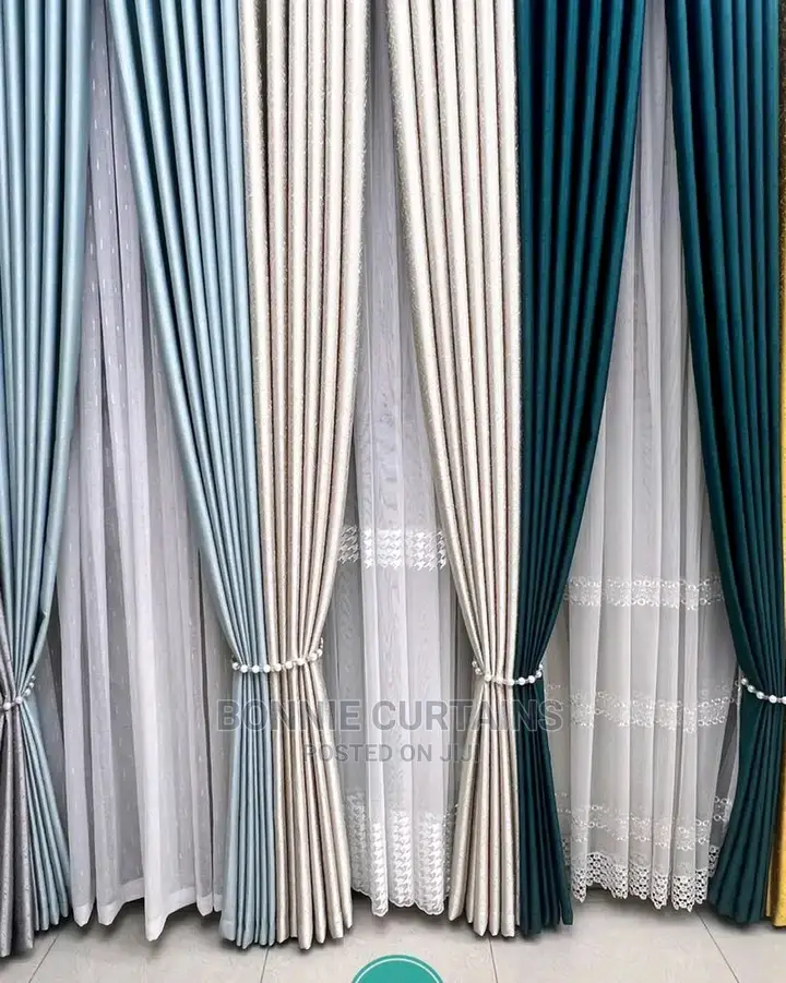 Dealers in All Designs of Curtains and Shears